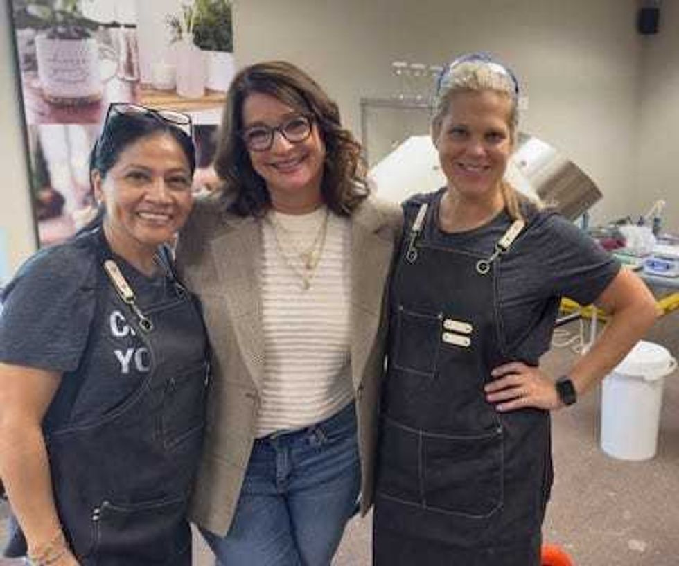 Lynette Lovelace pictured with two Life Therapy employees
