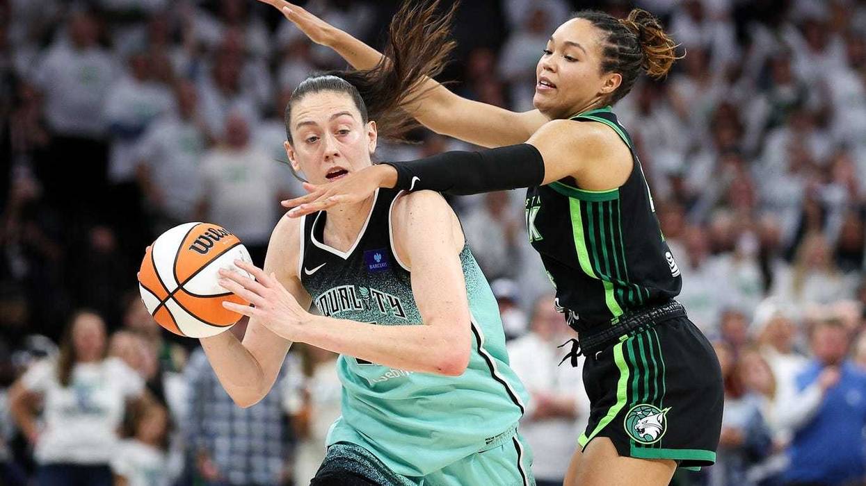 Lynx forward Napheesa Collier (24) defends against New York Liberty forward Breanna Stewart (30) during the second half of game three of the 2024 WNBA Finals at Target Center.