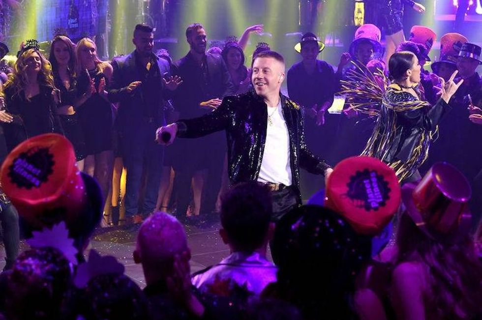 Macklemore raps that silent liberals care more about recycling than 'Black people dying'