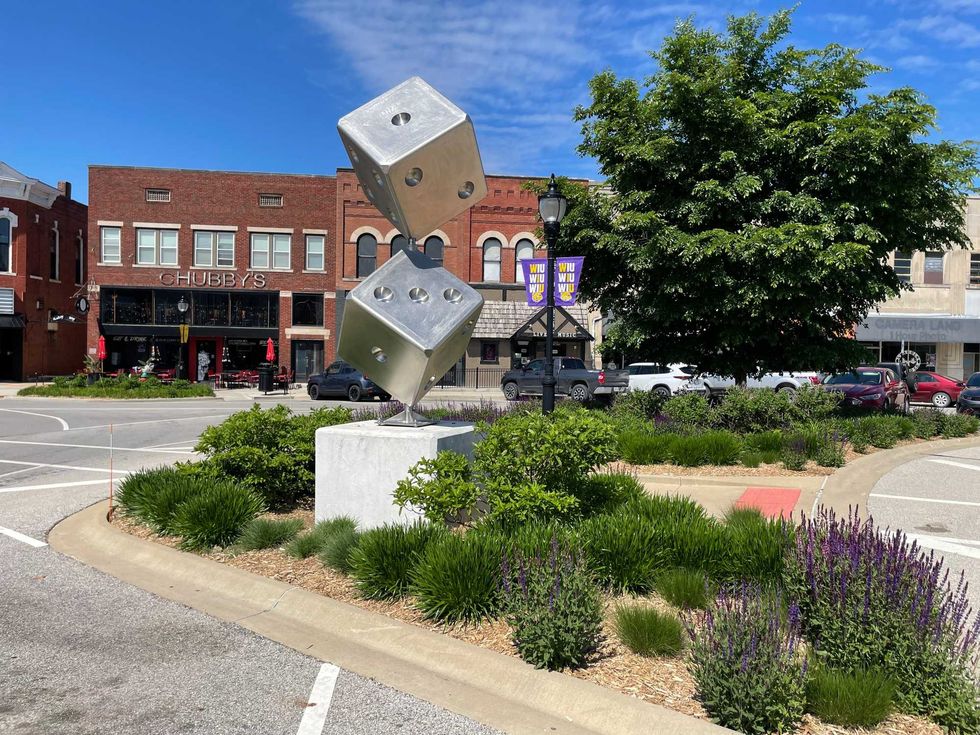 Macomb crews created giant Monopoly sculptures to go along with the permanent installation.
