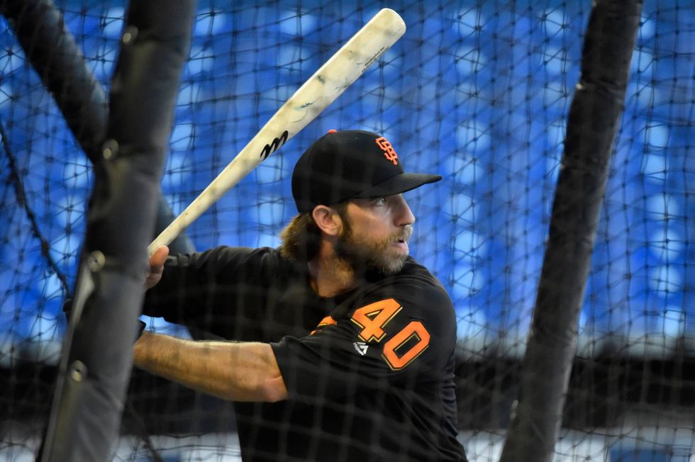 Madison Bumgarner getting loose in the batting cage