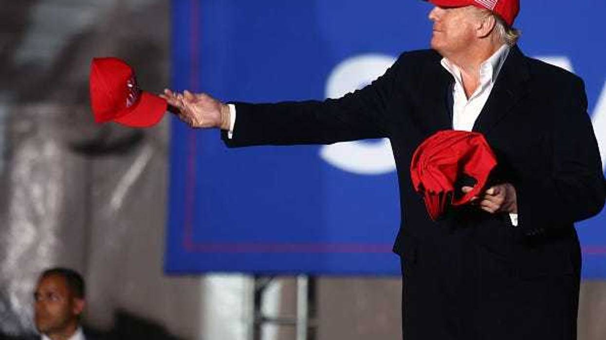 MAGA hat on Donald Trump