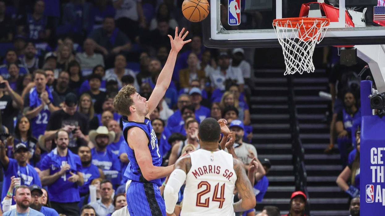 Magic forward Franz Wagner (22) shoots the ball in front of Cleveland Cavaliers forward Marcus Morris Sr. (24) during the first quarter of game six of the first round for the 2024 NBA playoffs at Kia Center.