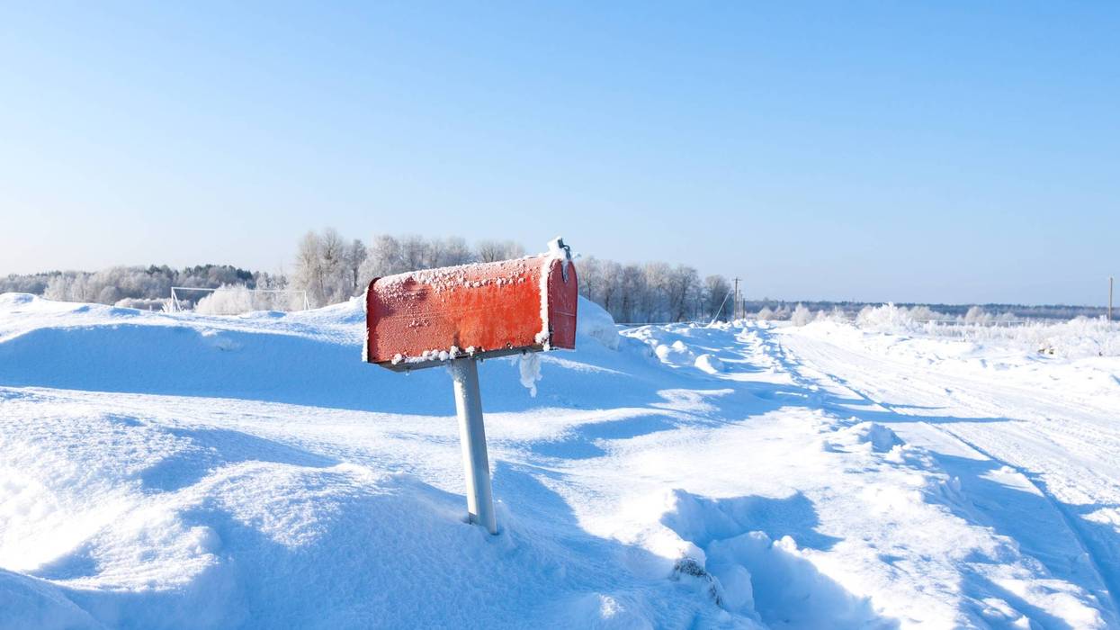 Mail box buried in snow
