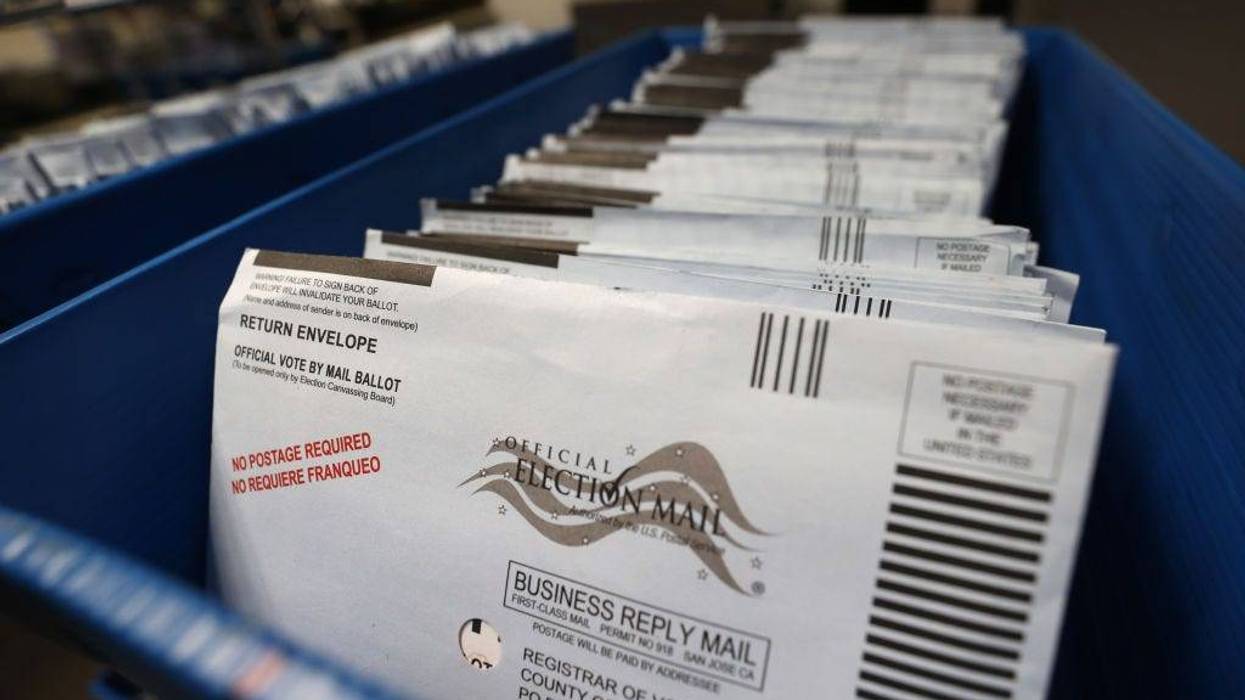 Mail-in ballots sit in trays before being sorted at the Santa Clara County registrar of voters office on October 13, 2020 in San Jose, California.