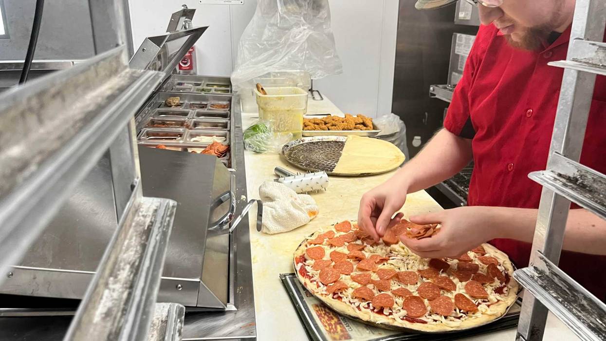 Makin' some pizza at Santora's on Transit Road. 10/28/2022