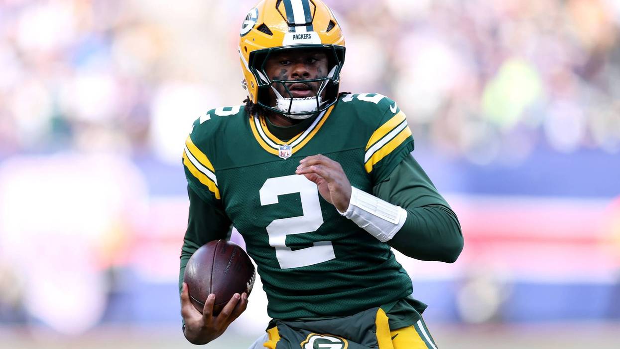 Malik Willis #2 of the Green Bay Packers runs with the ball during the first half against the New York Giants at MetLife Stadium on November 16, 2025 in East Rutherford, New Jersey