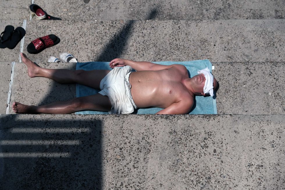 Man beating heat in Queens