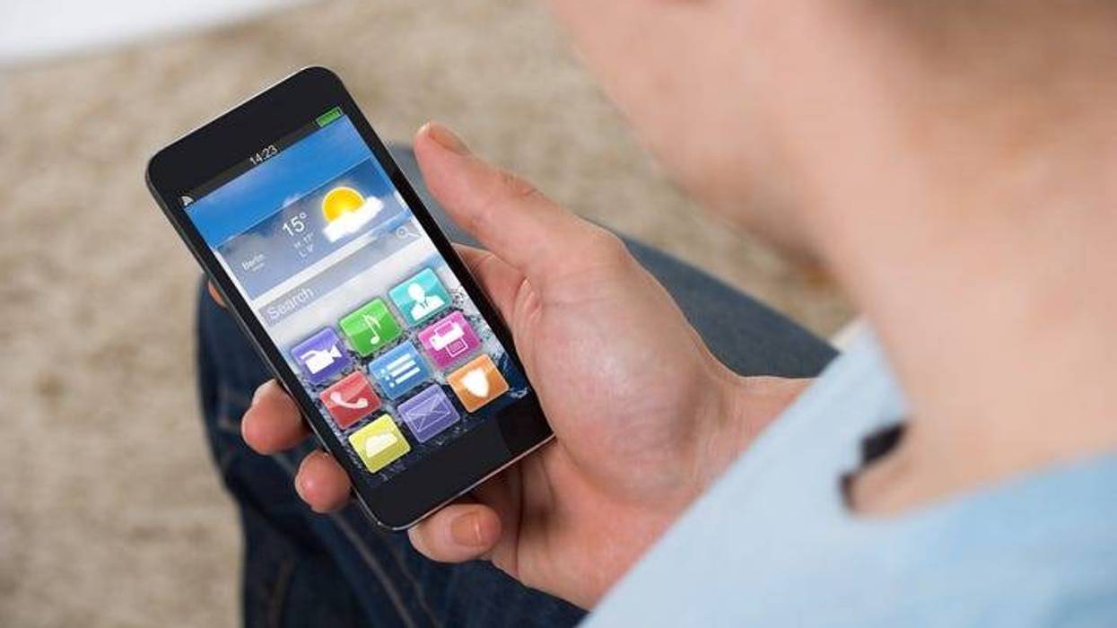 Man Checking Weather On His Phone