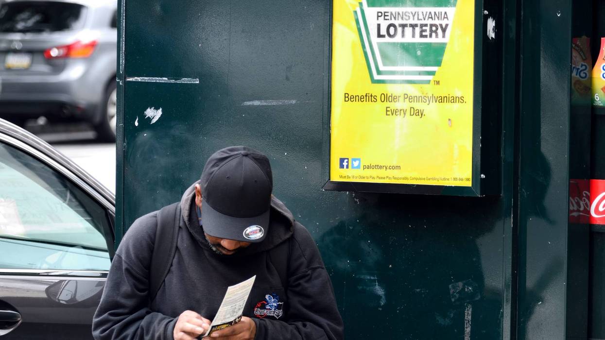 Man checks lotto ticket