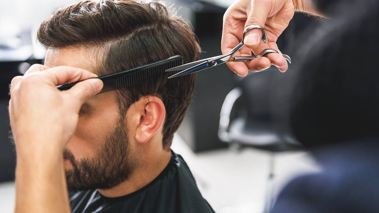 man getting hair cut