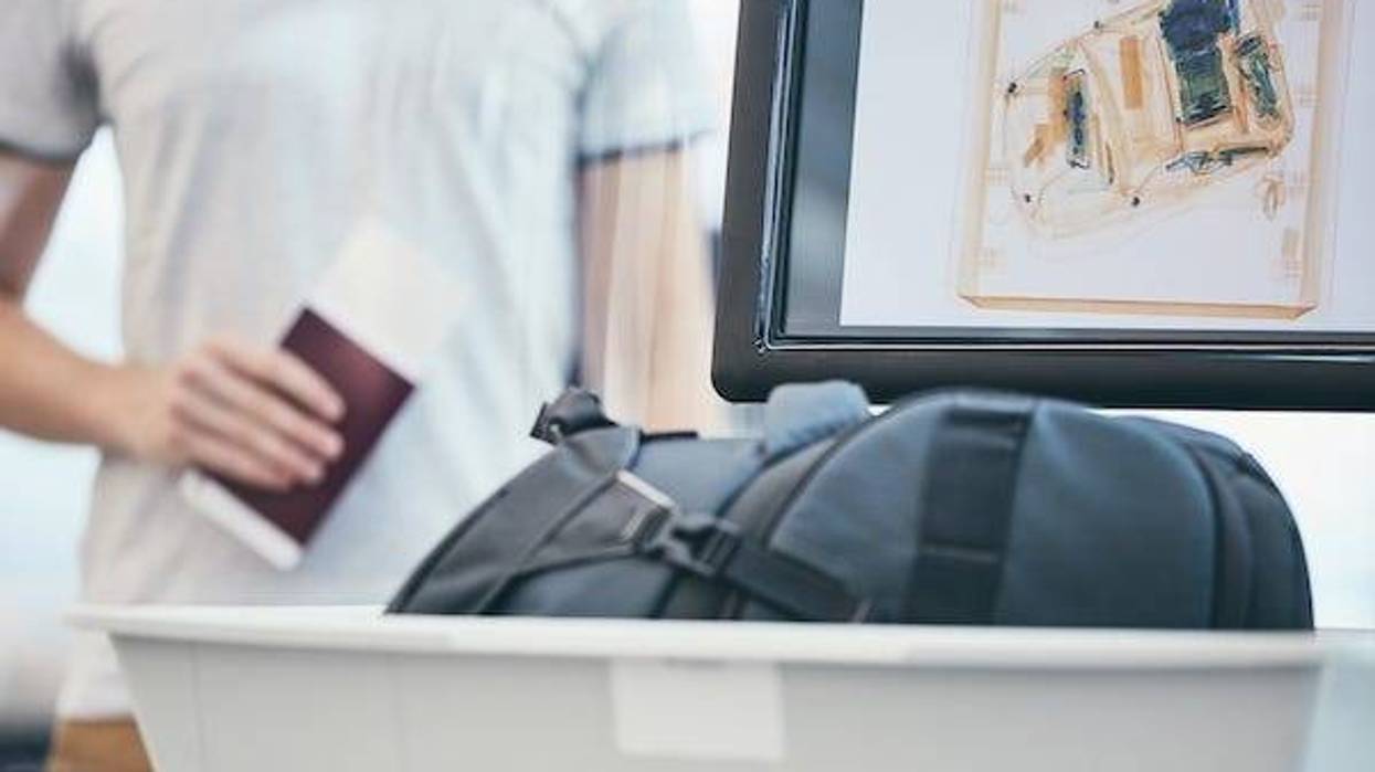 Man going through security at airport