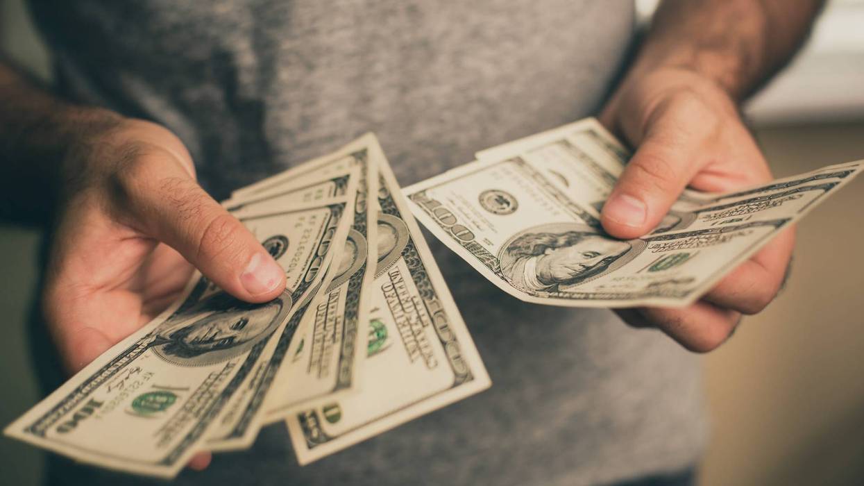 Man holding cash