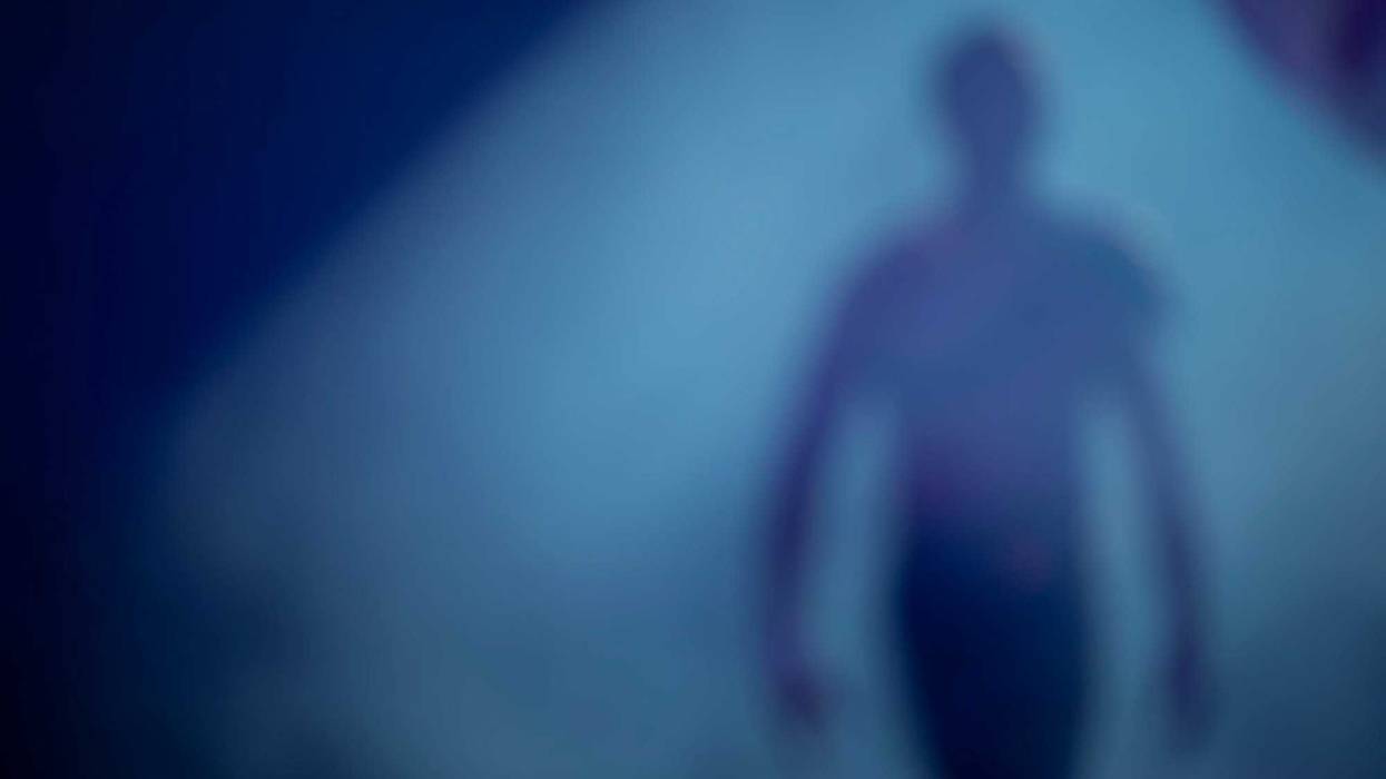 Man in the shadows stock photo