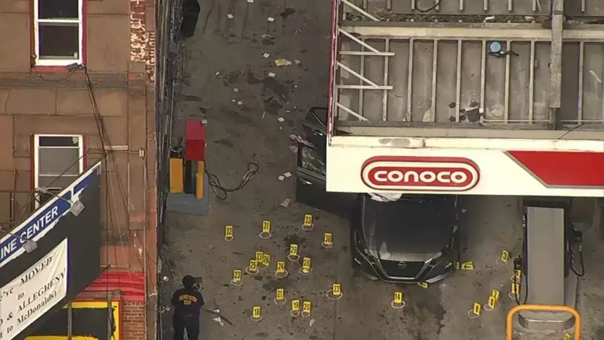 Man killed, 14-year-old injured in gas station shooting