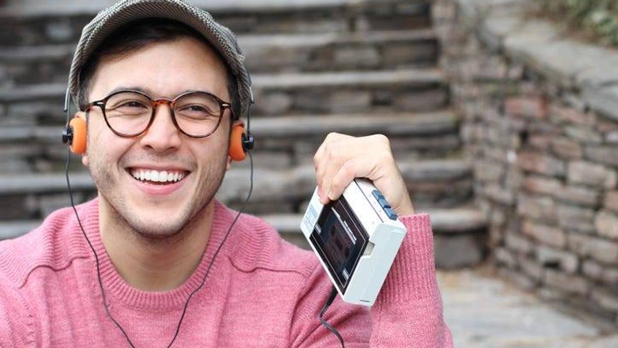 Man Listening To A Walkman