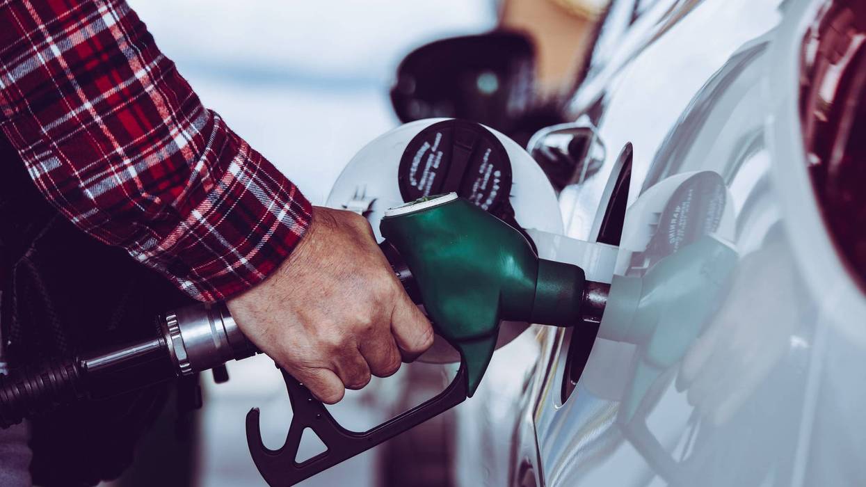 Man pumping gas