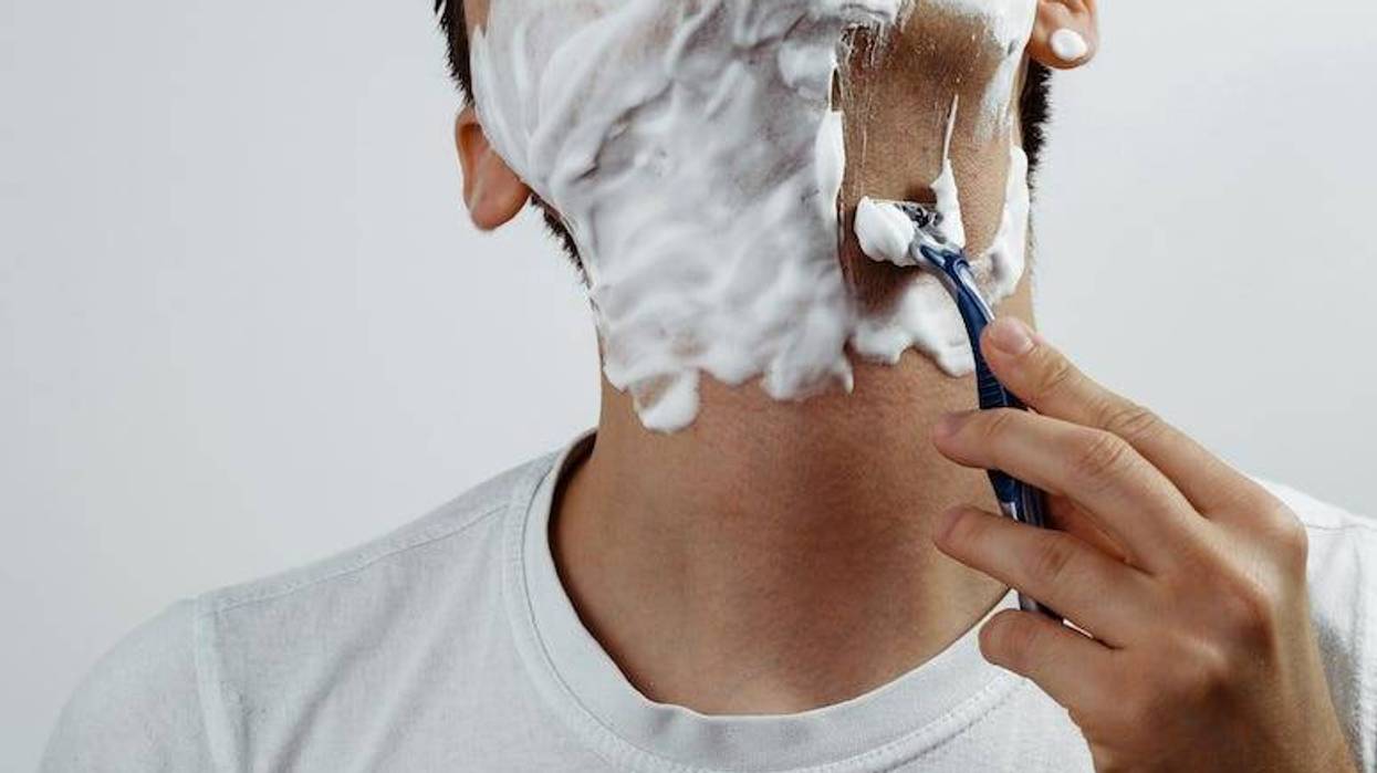 Man Shaving Face