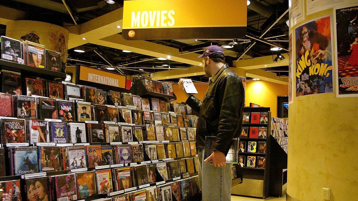 Man Shopping in Video Store