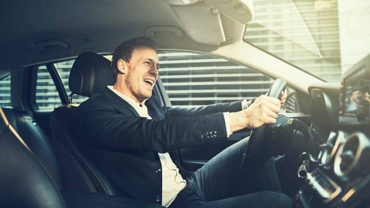 Man singing in car