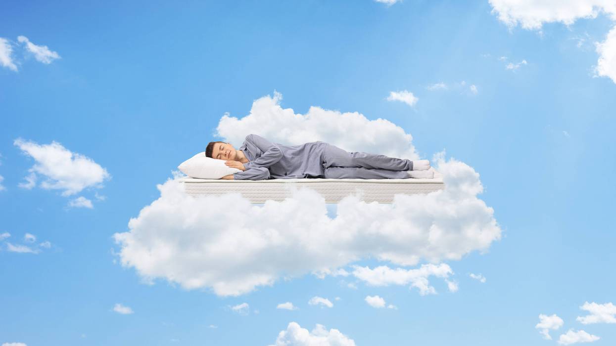 Man sleeping on a cloud