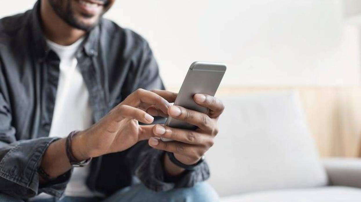 Man texting on phone