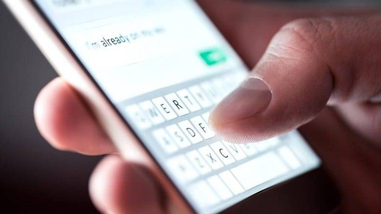 man texting