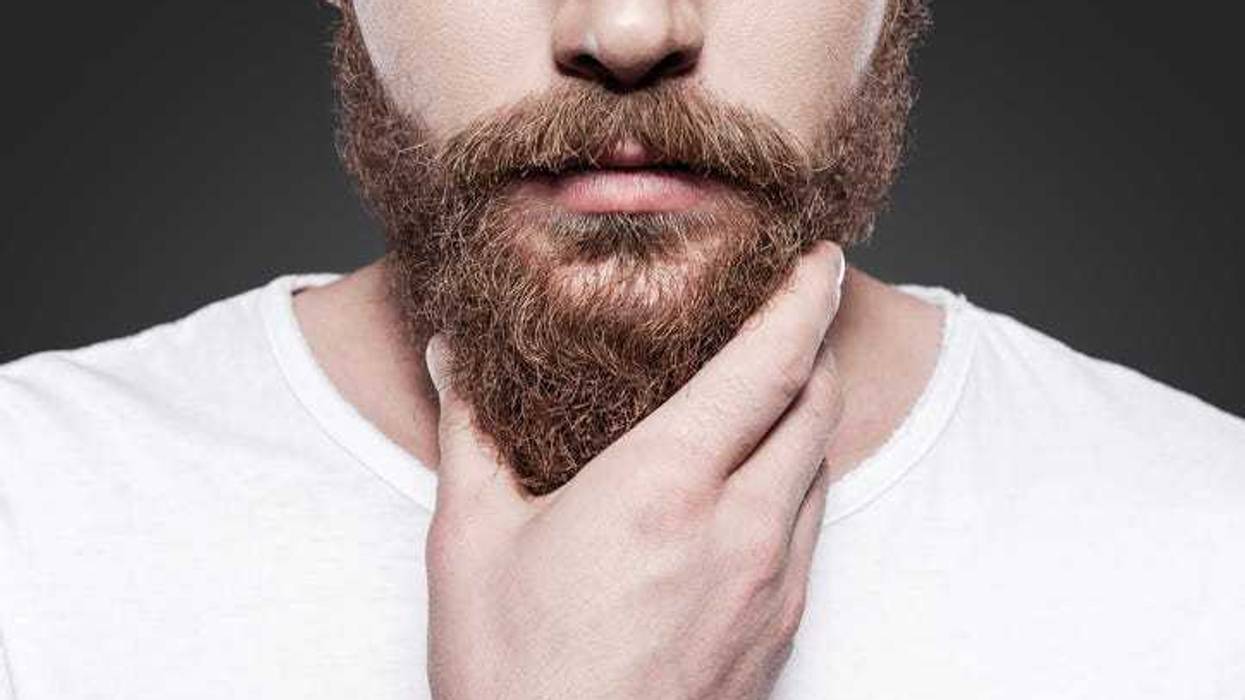 Man touching his beard