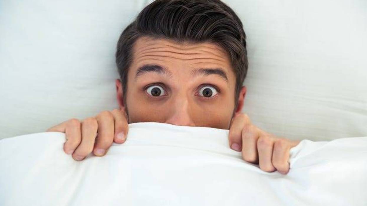 Man under the covers
