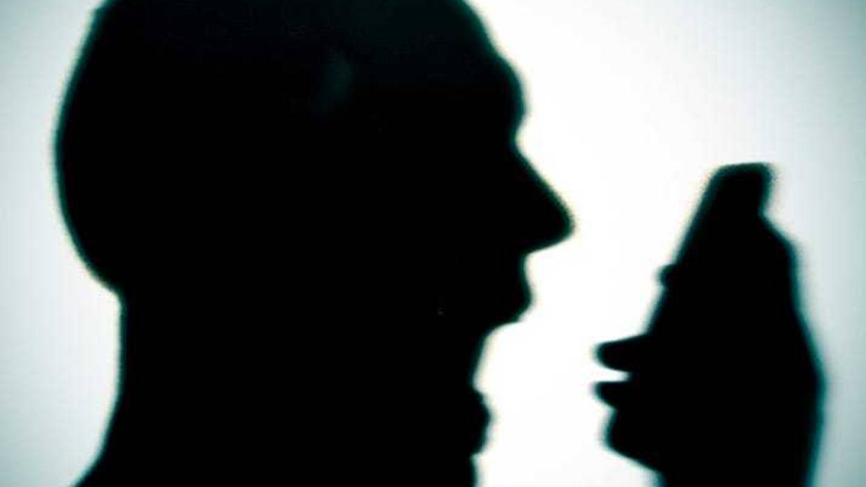 man yelling into phone