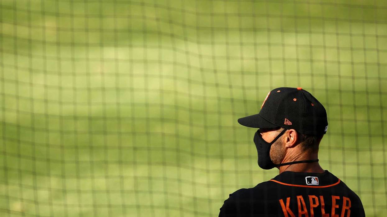 Manager Gabe Kapler of the San Francisco Giants stands in the dugout before their exhibition game against the Oakland Athletics at Oakland-Alameda County Coliseum on July 20, 2020 in Oakland, California.