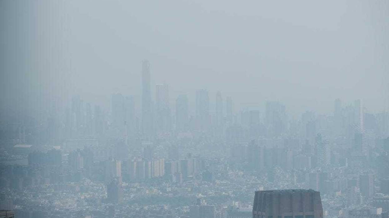 Manhattan is enveloped in a dense haze caused by wildfires in Canada on June 06, 2023 in New York City.