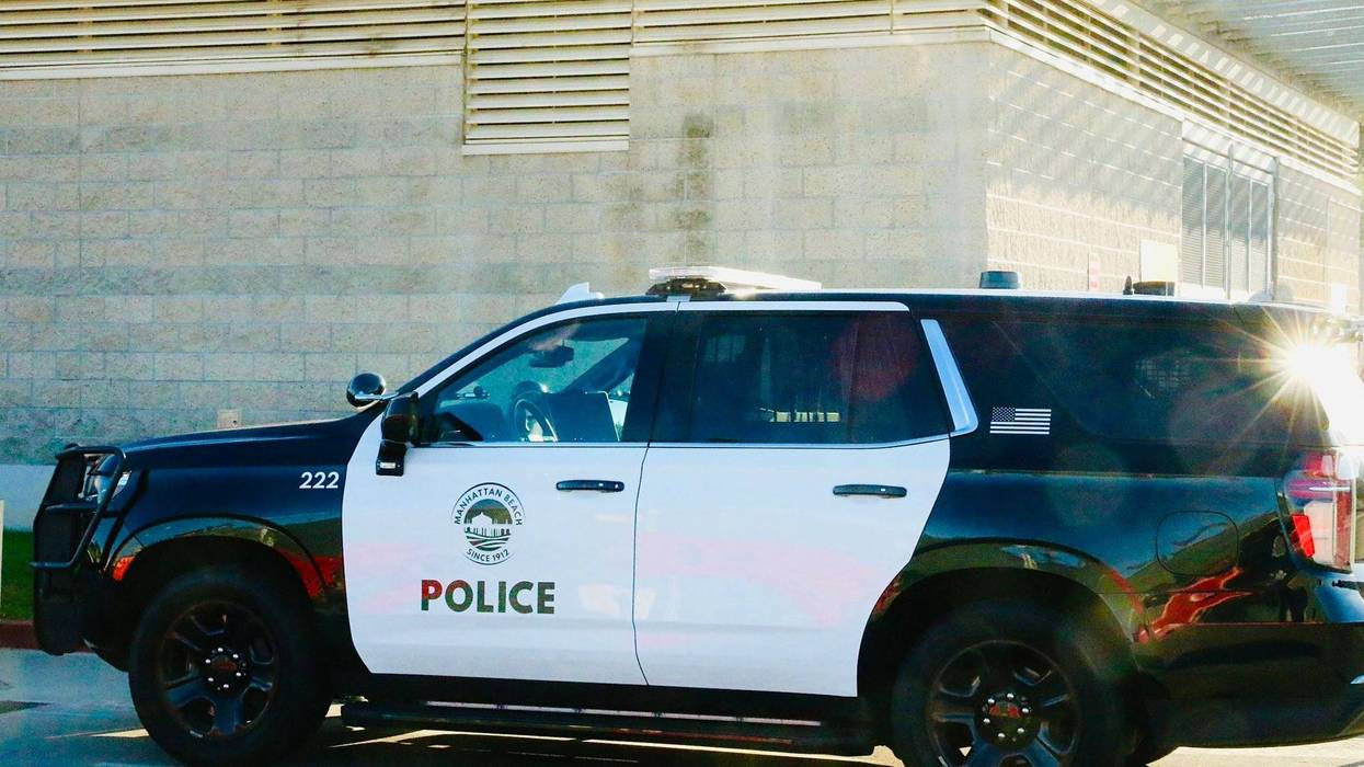 Manhattan Police Department car waiting outside Harbor-UCLA Medical Center where an officer died following a crash on the 405