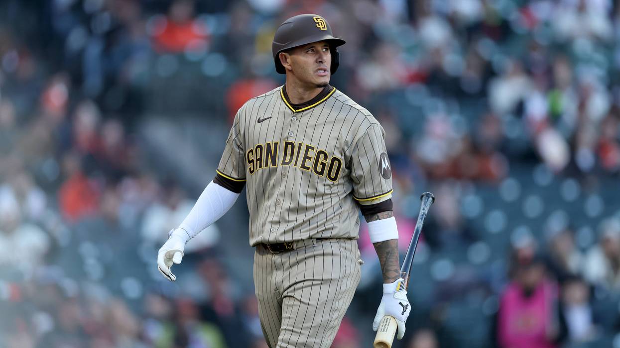 Manny Machado #13 of the San Diego Padres walks back to the dugout after striking out against the San Francisco Giants at Oracle Park on May 05, 2026 in San Francisco, California.