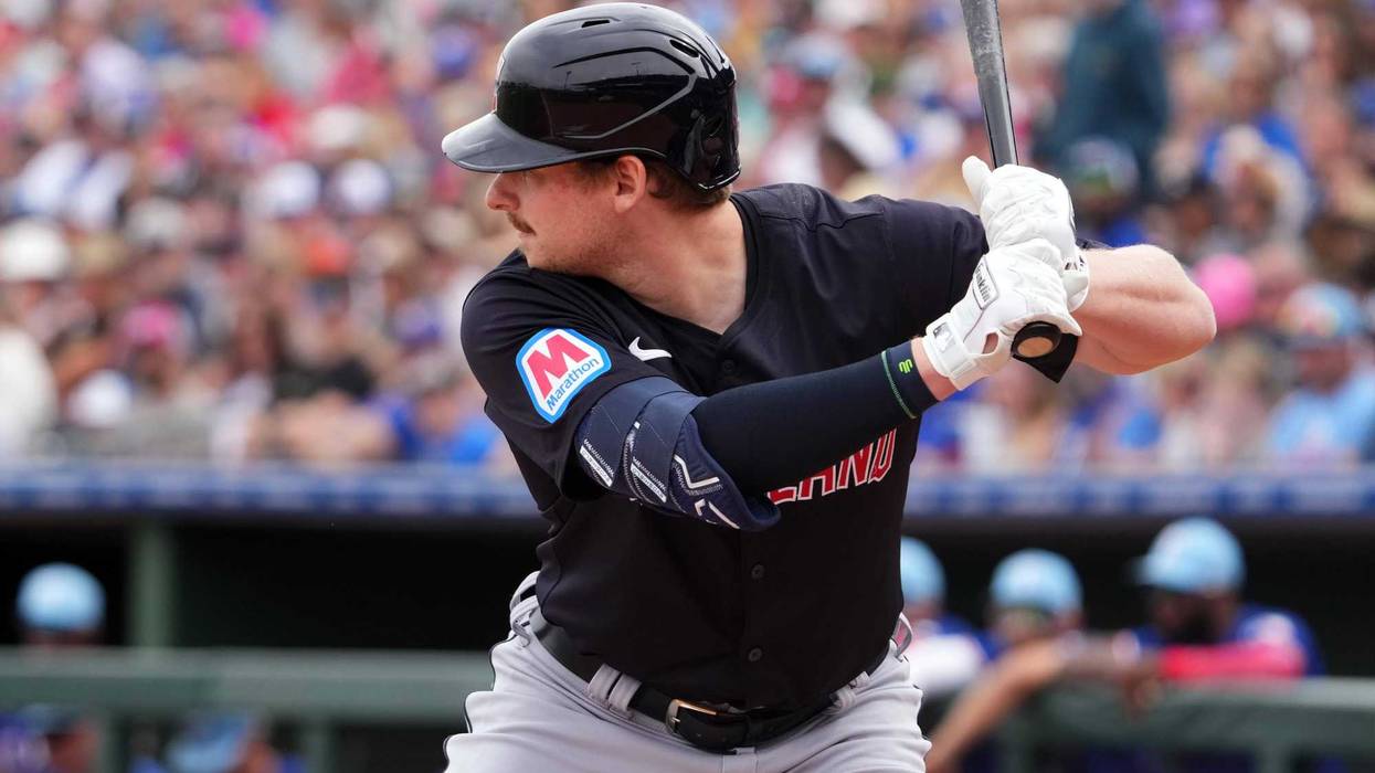 Mar 12, 2024; Surprise, Arizona, USA; Cleveland Guardians designated hitter Kyle Manzardo (73) bats against the Texas Rangers during the second inning at Surprise Stadium.
