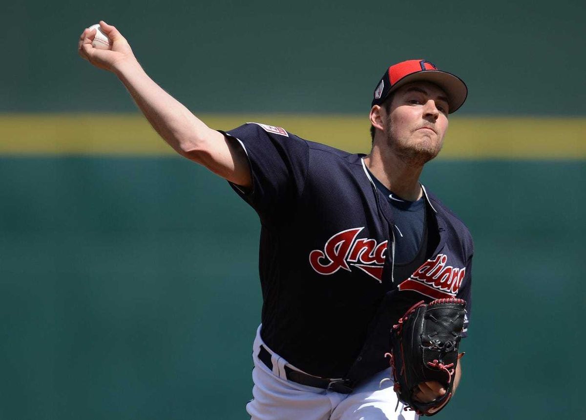 Mar 13, 2019; Goodyear, AZ, USA; Cleveland Indians starting pitcher Trevor Bauer (47) pitches against the Milwaukee Brewers during the first inning at Goodyear Ballpark. Mandatory Credit: Joe Camporeale-USA TODAY Sports