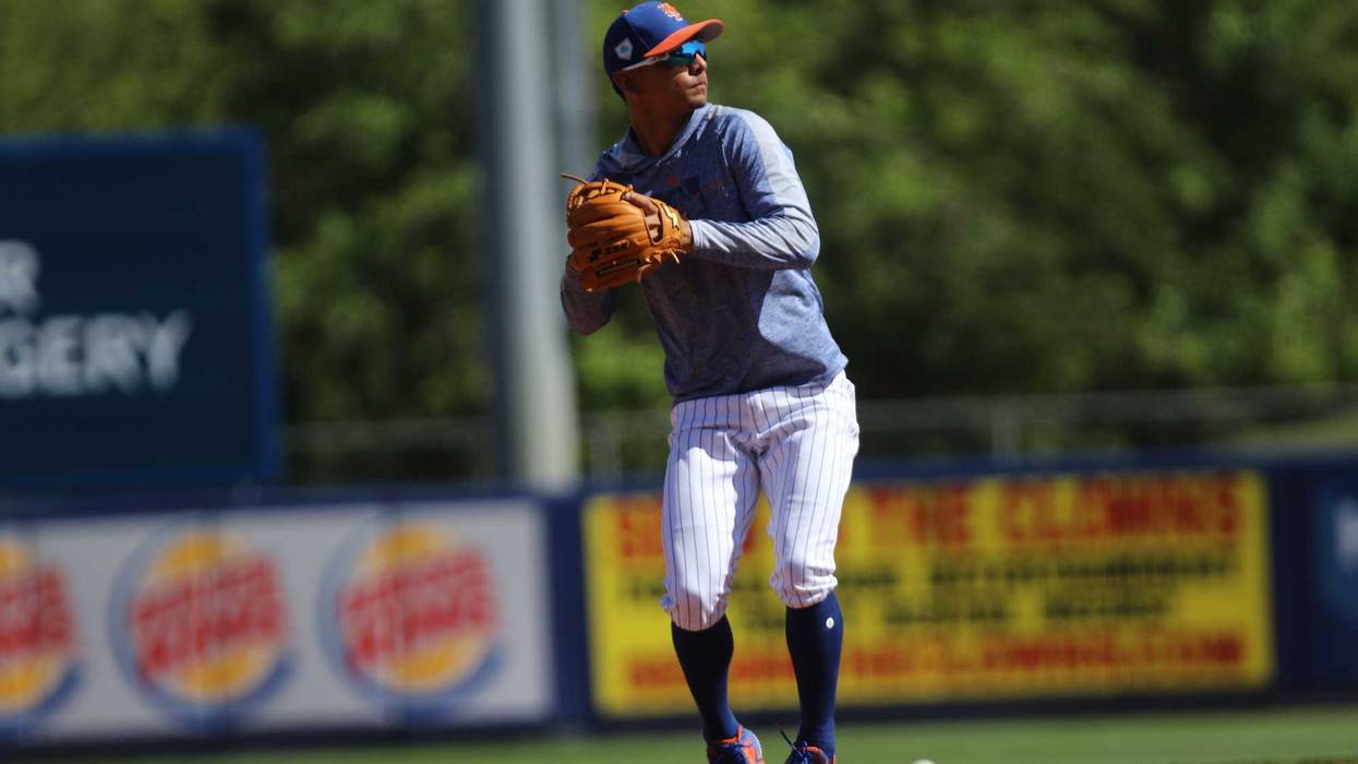 Mar 18, 2017; Jupiter, FL, USA; New York Mets shortstop Andres Gimenez (83) connects for a base hit against the St. Louis Cardinals during a spring training game at Roger Dean Stadium. The Mets defeated the Cardinals 5-4. Mandatory Credit: Scott Rovak-USA