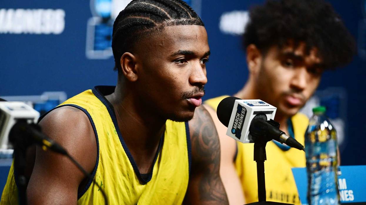 Mar 20, 2025; Cleveland, OH, USA; Marquette Golden Eagles guard Kam Jones (1) talks to the media before practice at Rocket Arena. Mandatory Credit: Ken Blaze-Imagn Images