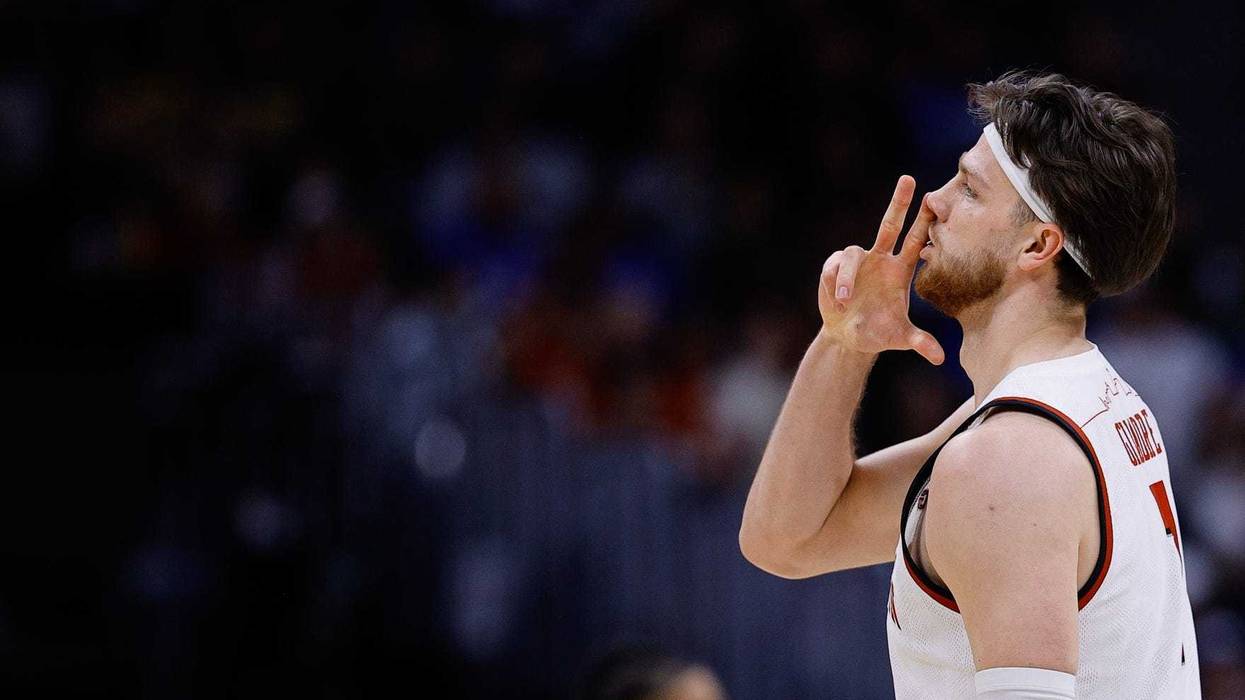 Mar 20, 2025; Denver, CO, USA; Wisconsin Badgers forward Carter Gilmore (7) celebrates after a basket against the Montana Grizzlies during the second half in the first round of the NCAA Tournament at Ball Arena. Mandatory Credit: Isaiah J. Downing-Imagn Images