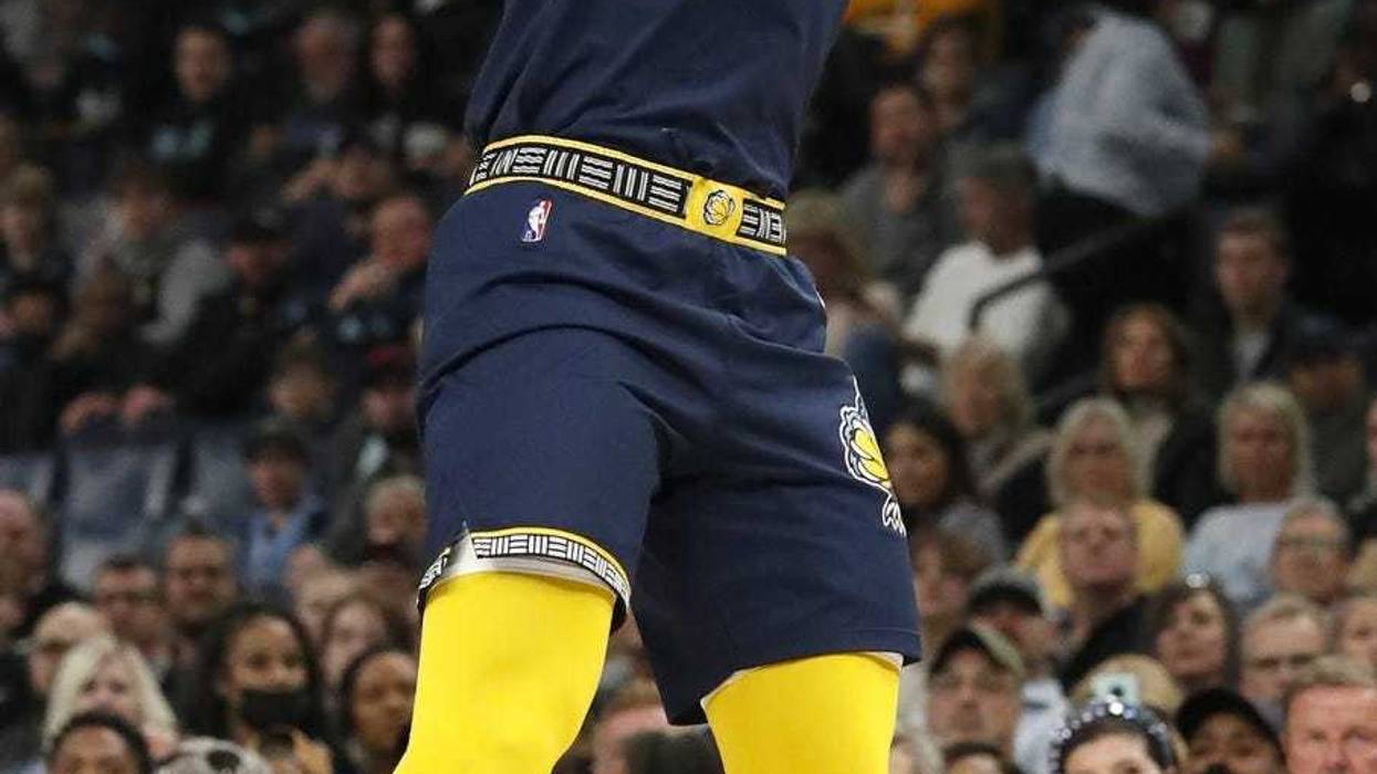 Mar 26, 2022; Memphis, Tennessee, USA; Memphis Grizzlies guard Desmond Bane (22) shoots a three point field goal against the Milwaukee Bucks during the first half at FedExForum. Mandatory Credit: Christine Tannous-Imagn Images
