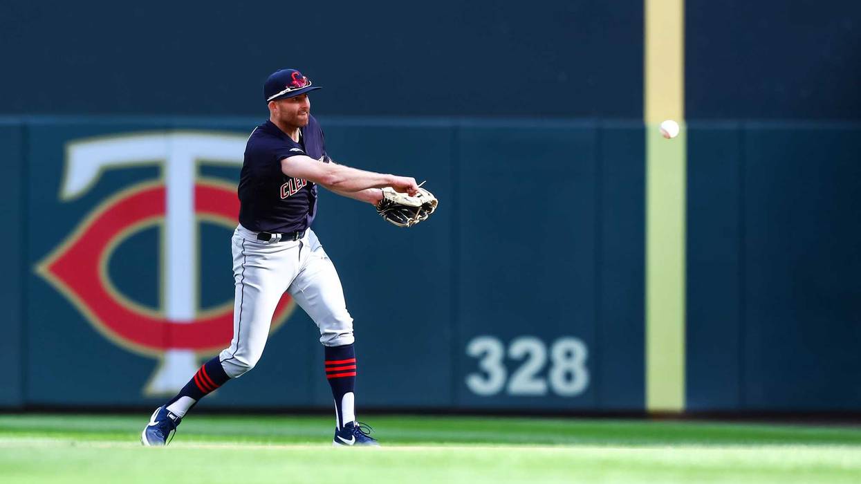 Mar 28, 2019; Minneapolis, MN, USA; Cleveland Indians second baseman Brad Miller (17) throws to first base in the bottom of the eighth inning against the Minnesota Twins at Target Field. The Minnesota Twins defeated the Cleveland Indians 2-0. Mandatory Cr