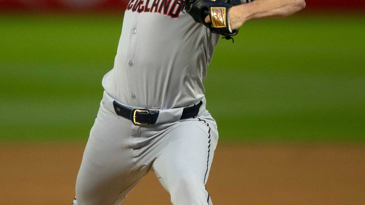 Mar 28, 2024; Oakland, California, USA; Cleveland Guardians starting pitcher Shane Bieber (57) delivers a pitch against the Oakland Athletics during the first inning at Oakland-Alameda County Coliseum.