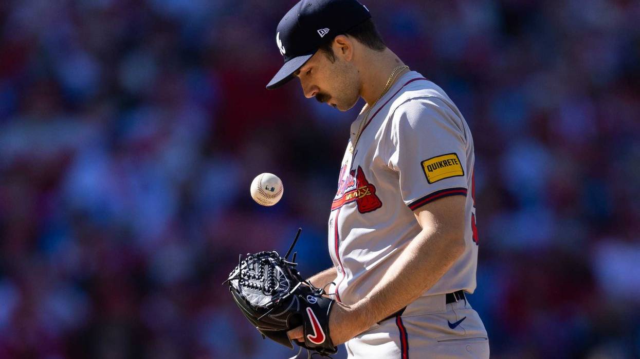 Mar 29, 2024; Philadelphia, Pennsylvania, USA; Atlanta Braves starting pitcher Spencer Strider (99) prepares to throw a pitch against the Philadelphia Phillies on opening day at Citizens Bank Park. Mandatory Credit: Bill Streicher-USA TODAY Sports