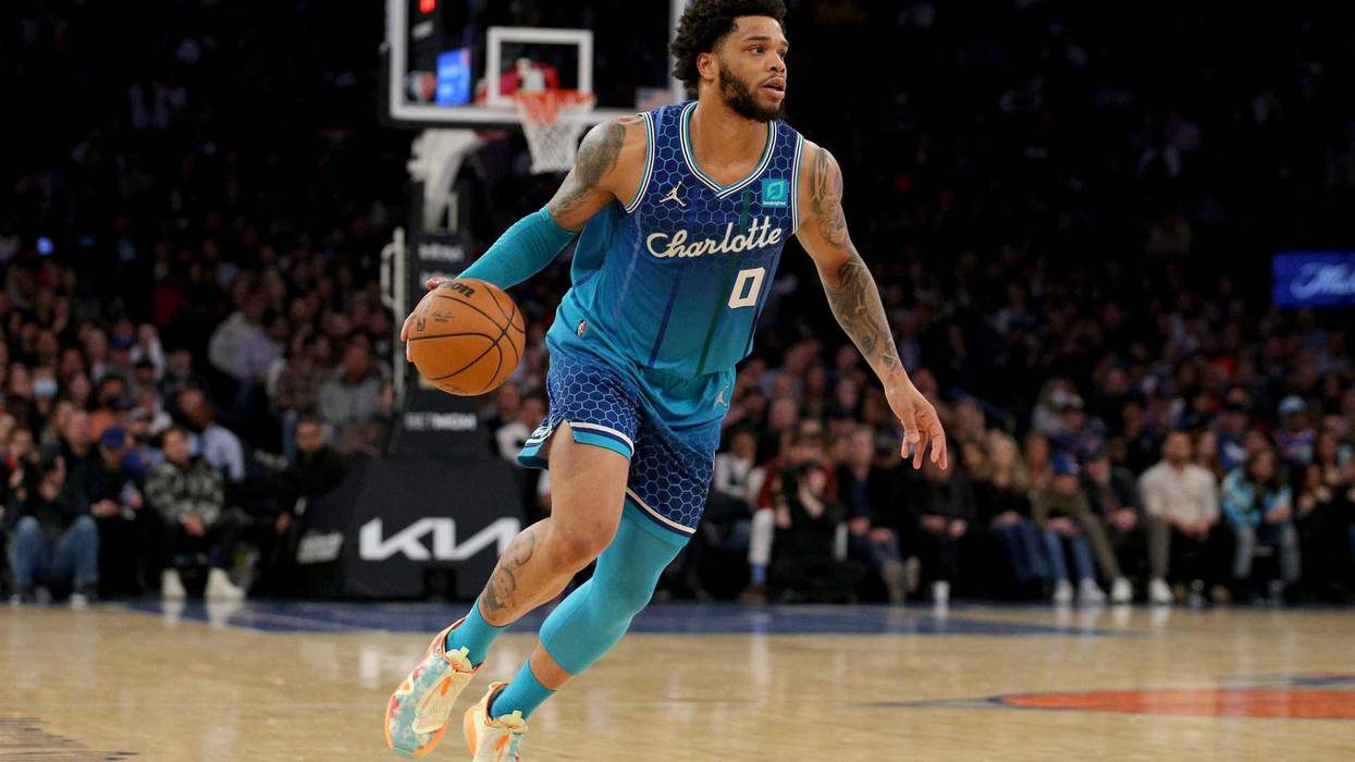 Mar 30, 2022; New York, New York, USA; Charlotte Hornets forward Miles Bridges (0) brings the ball up court against the New York Knicks during the second quarter at Madison Square Garden.