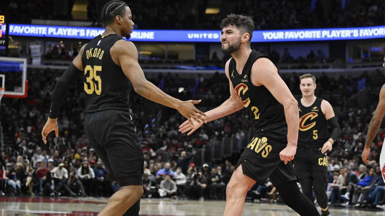 Mar 4, 2025; Chicago, Illinois, USA; Cleveland Cavaliers guard Ty Jerome (2) reacts with forward Isaac Okoro (35) after he scores against the Chicago Bulls during the second half at United Center.