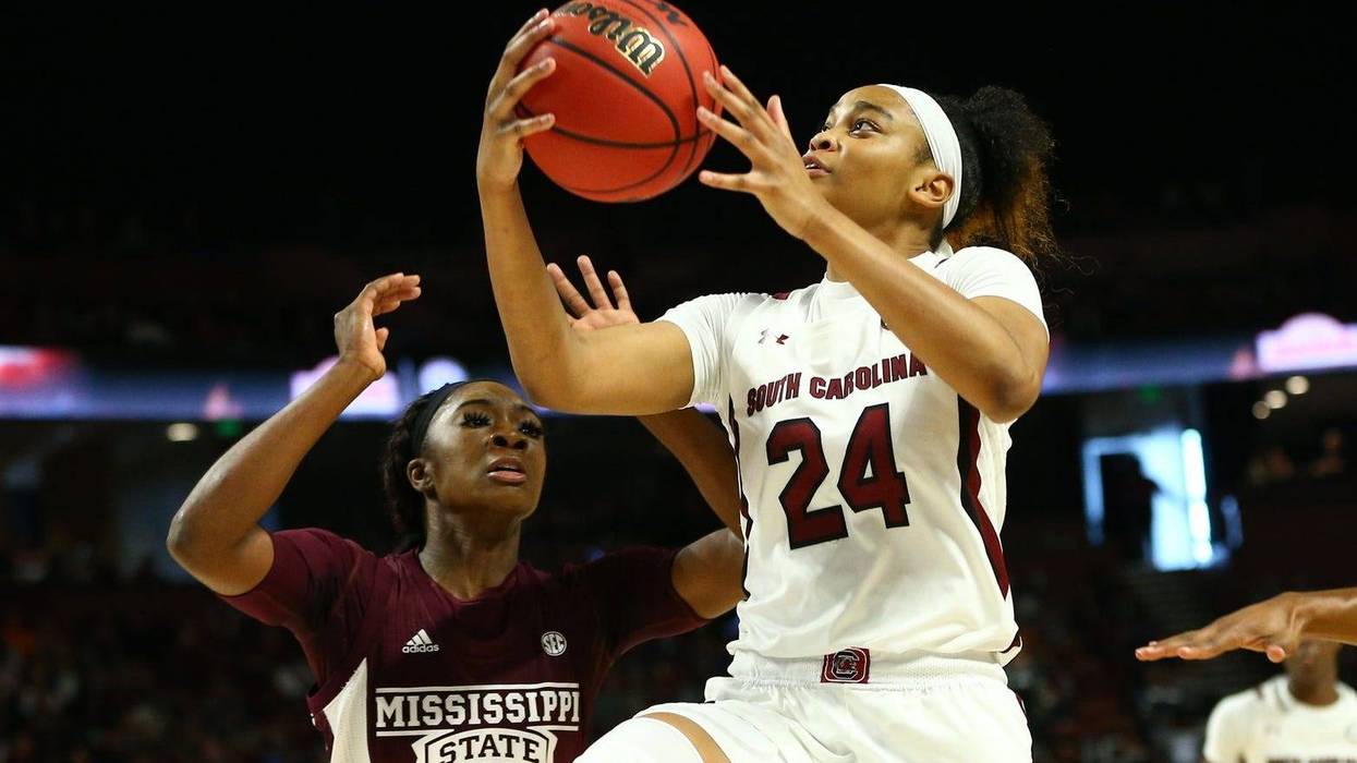 Mar 8, 2020; Greenville, SC, USA; South Carolina Gamecocks guard LeLe Grissett (24) goes up for a shot against Mississippi State Bulldogs guard Xaria Wiggins (11) during the second half during the SEC Conference Championship at Bon Secours Wellness Arena.