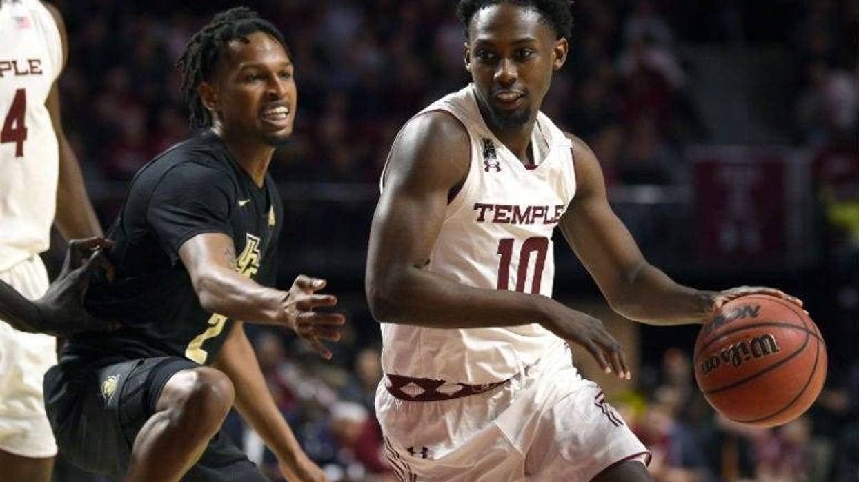 Mar 9, 2019; Philadelphia, PA, USA; Temple Owls guard Shizz Alston Jr. (10) dribbles past UCF Knights guard Terrell Allen (2) during the first half at Liacouras Center.