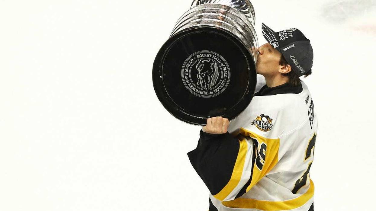 Marc-Andre Fleury kissing Stanley Cup