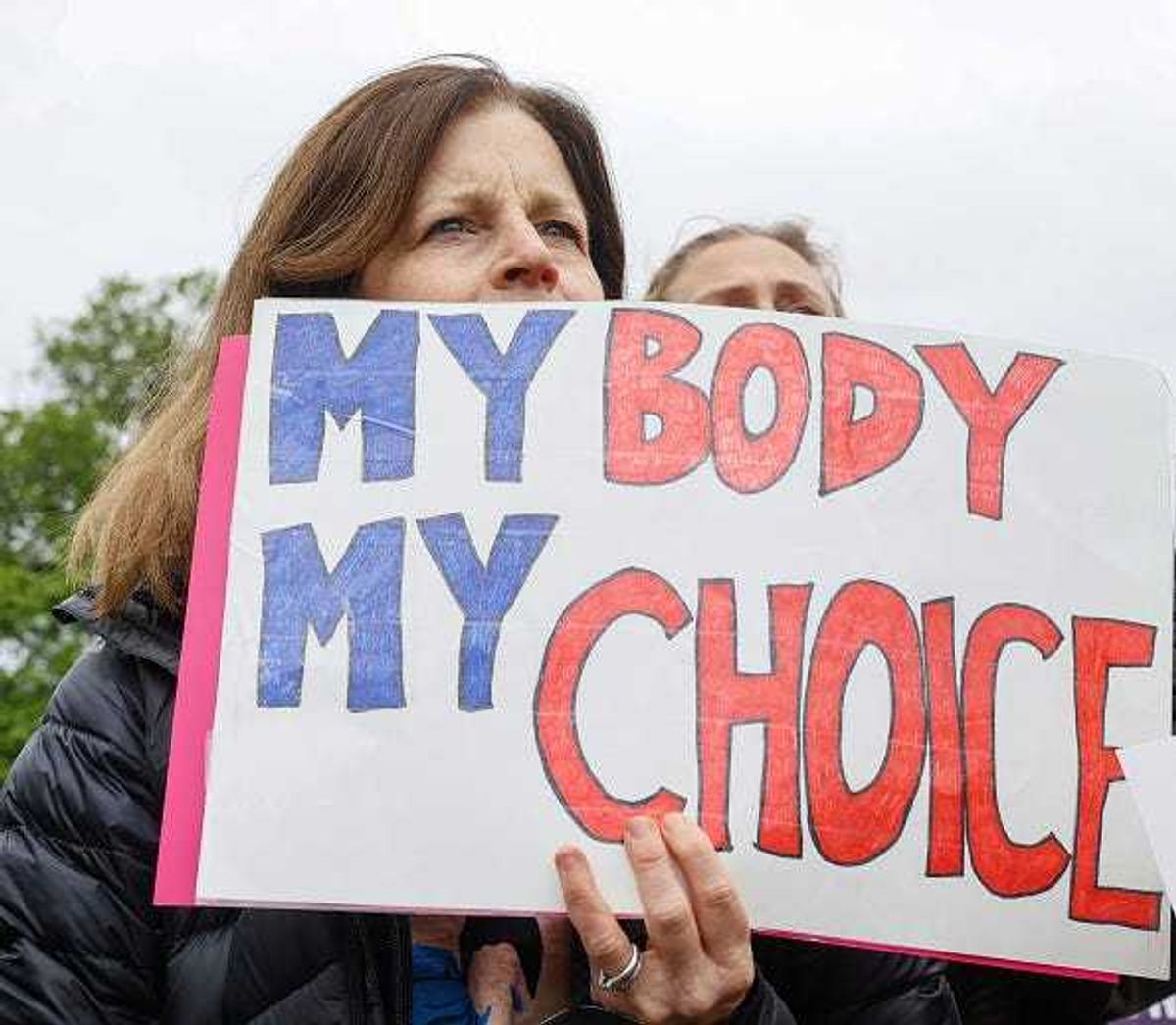 Marchers hold up signs during a Mothers Day rally in support of Abortion rights at the U.S. Supreme Court on May 08, 2022 in Washington, DC.
