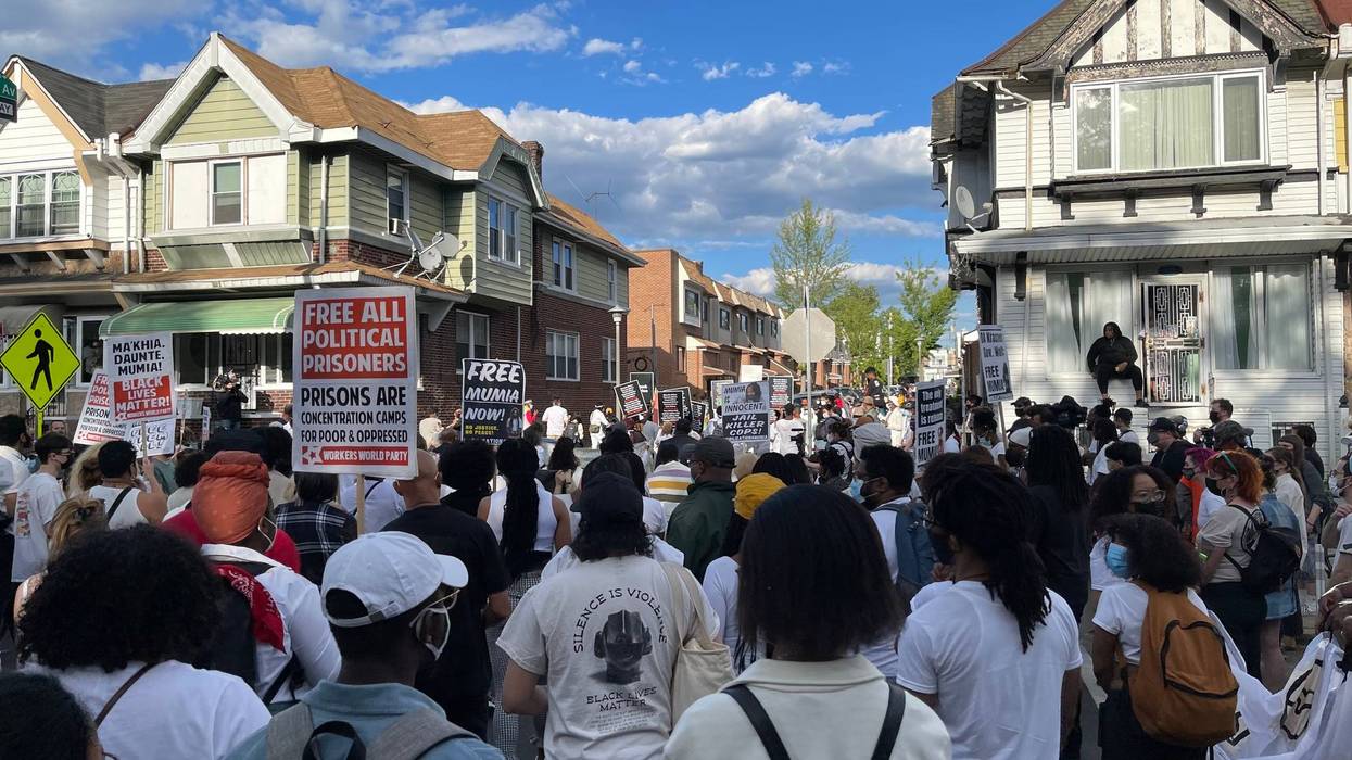 Marchers marking 36 years after the MOVE bombing in West Philadelphia.